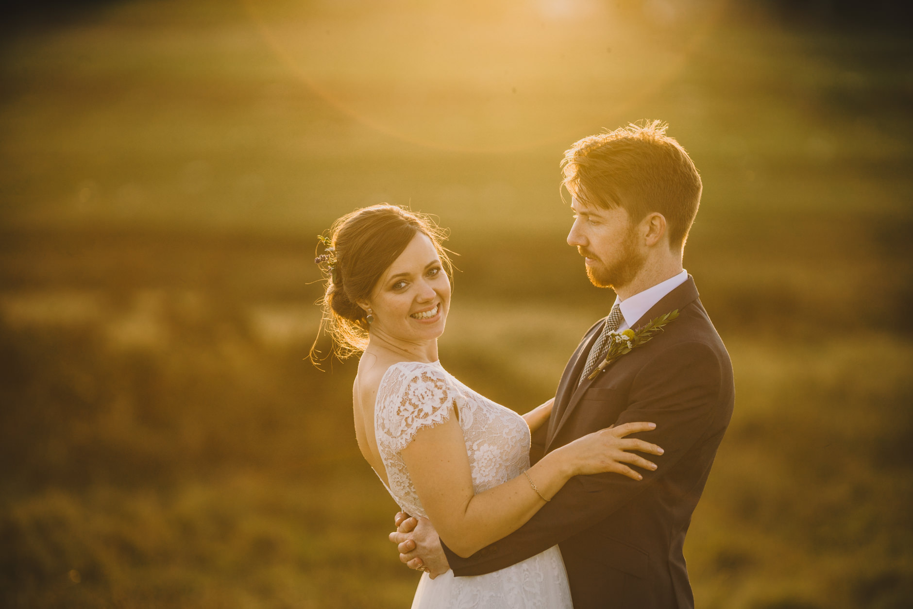 bride and groom at sunset on the day of their knipe hall wedding