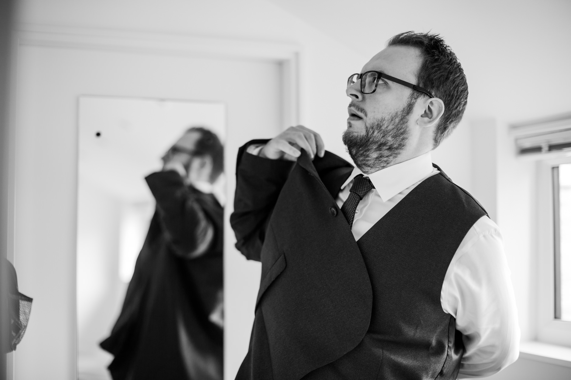 groom getting dressed ahead of his skipton registry office wedding