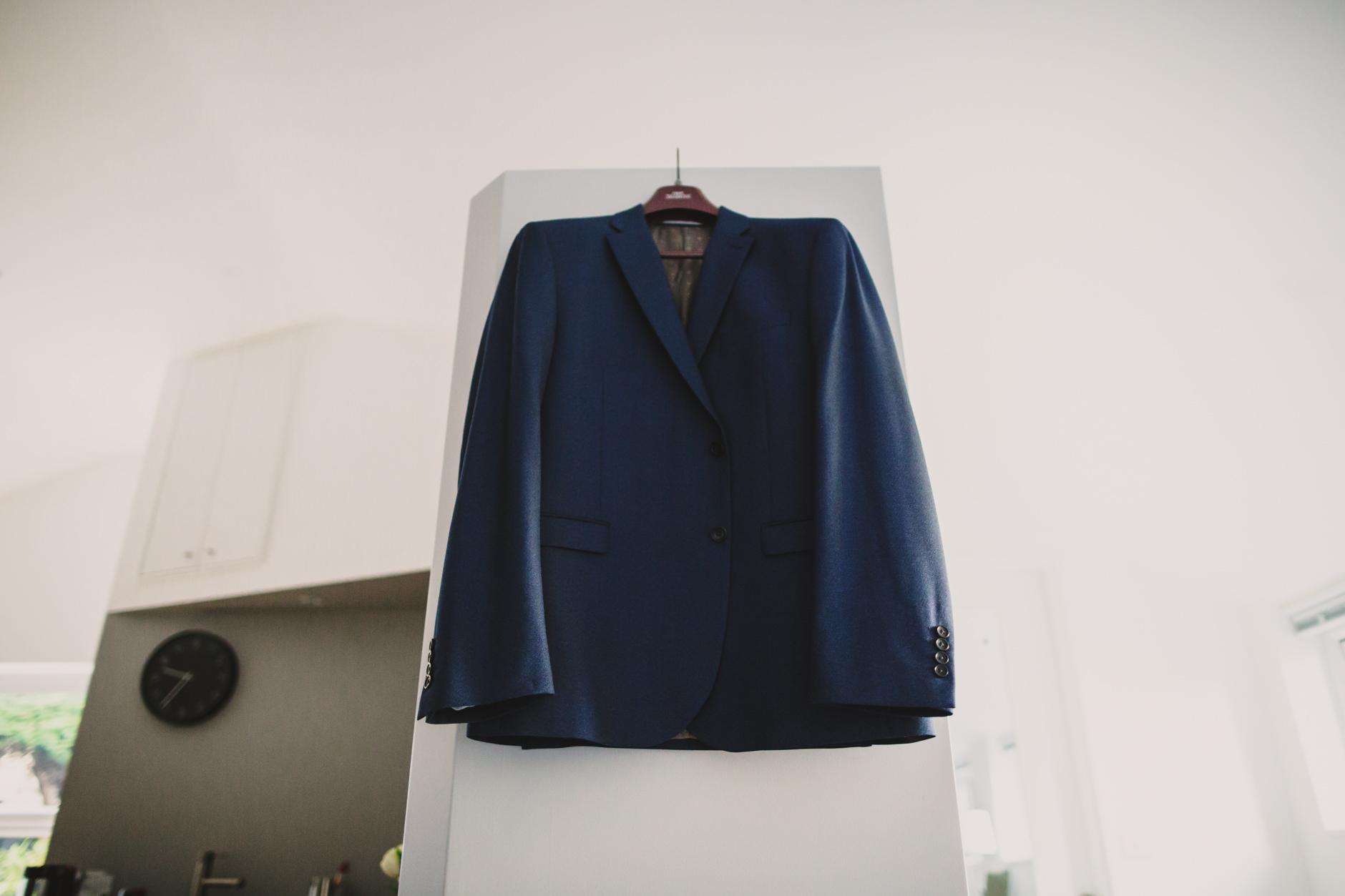 groom's suit hanging in ilkley air bnb apartment