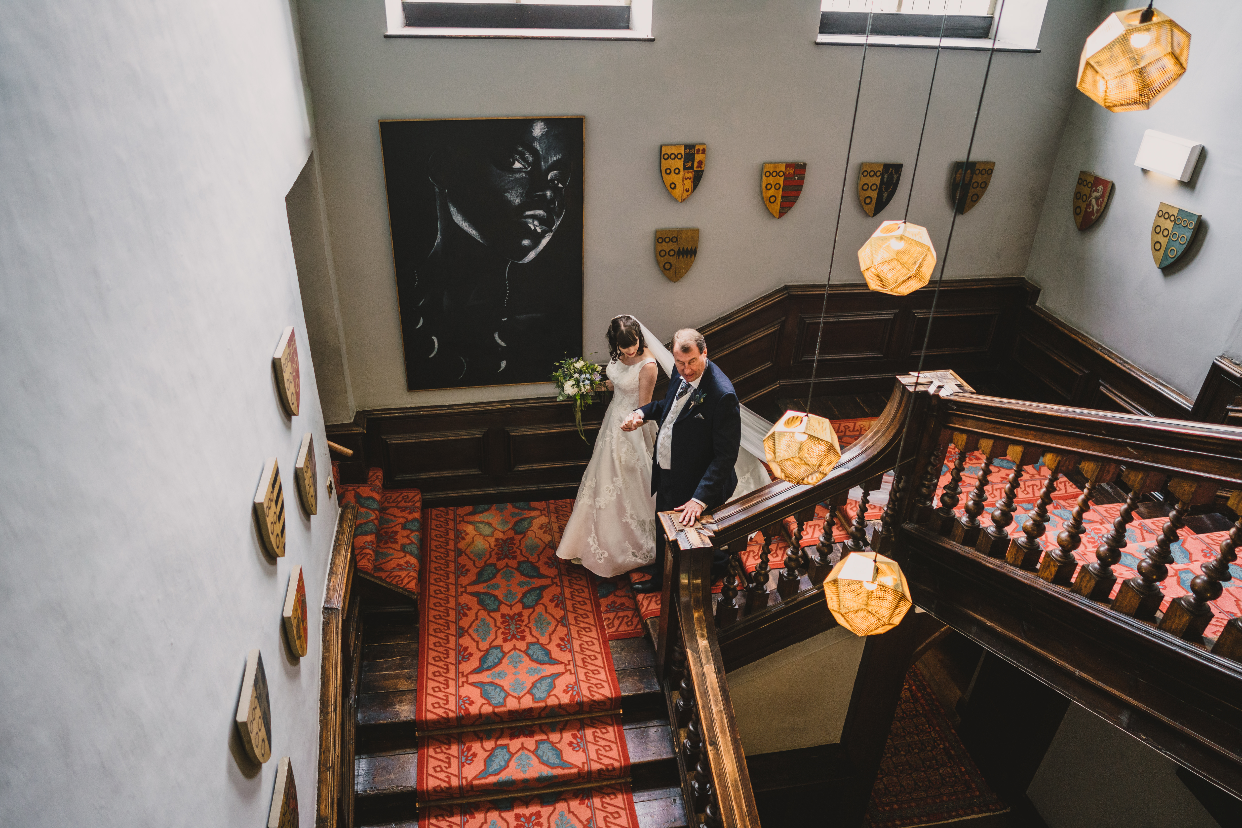 father walks bride down the stairs at askham hall