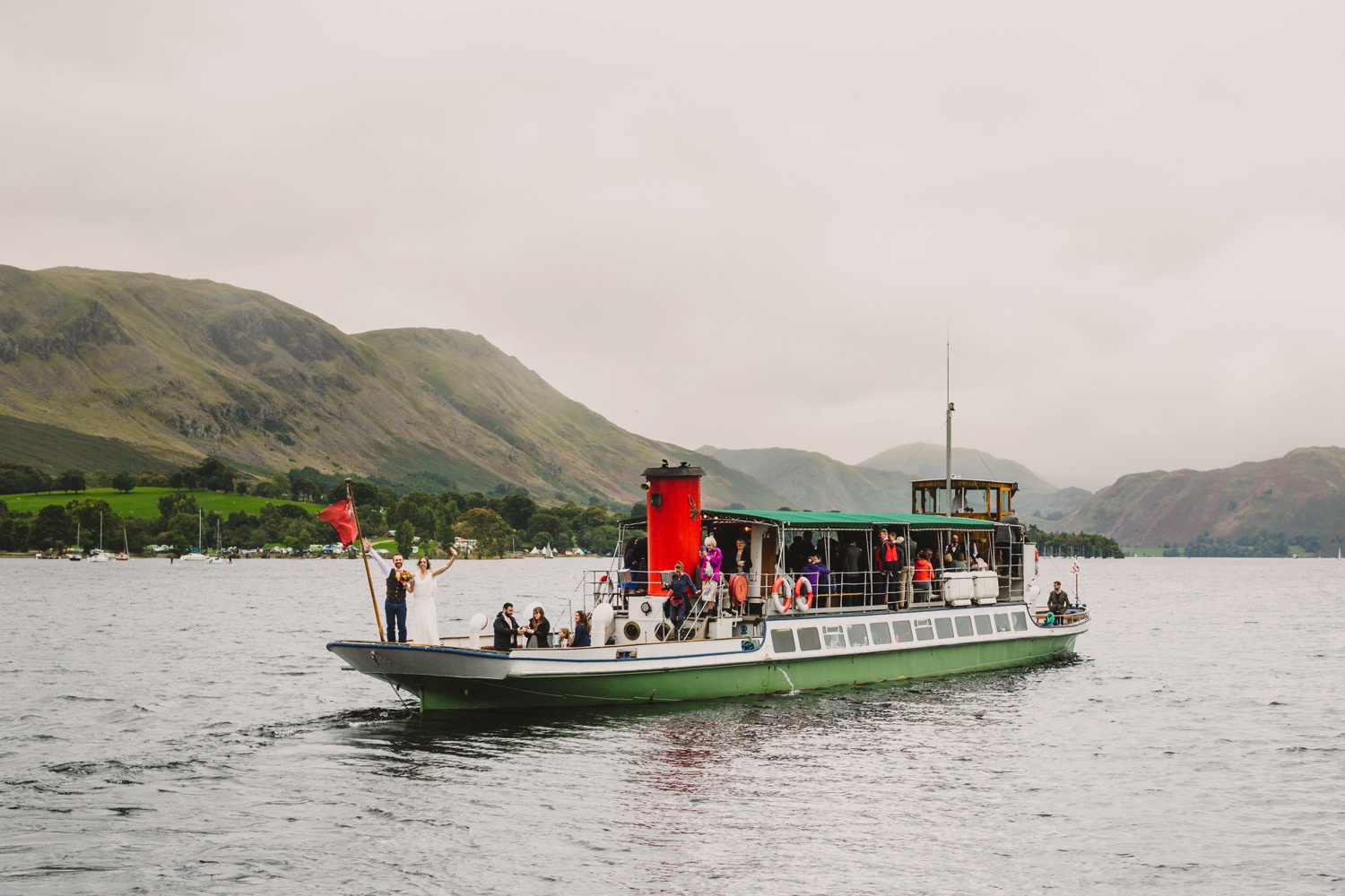Wedding party boat trip on lake Hiking-wedding-Knipe-Hall-Cumbria